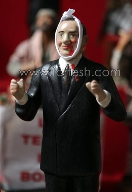 الآن في الأسواق: لعبة برلسكوني المدمى نتيجة الاعتداء صورة رقم 3 الآن في الأسواق: لعبة برلسكوني المدمى نتيجة الاعتداء صورة رقم 3