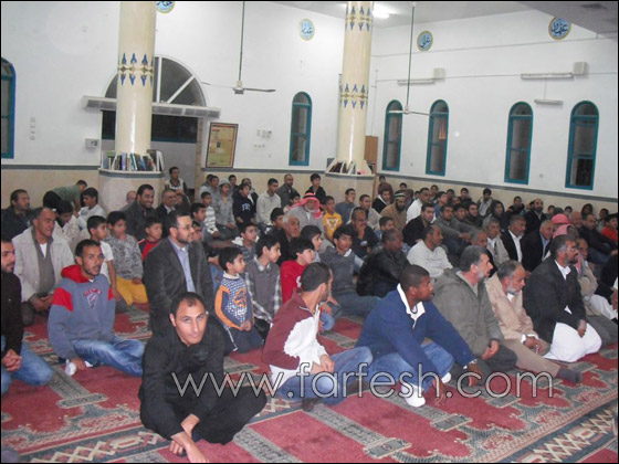 الحركة الإسلامية توزع جوائز مسابقة حفظ سور القرآن الكريم صورة رقم 4