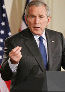 كسوة بوش الجديدة.. 18 بذلة من هونغ كونغ بدون أحذية!! صورة رقم 1 كسوة بوش الجديدة.. 18 بذلة من هونغ كونغ بدون أحذية!! صورة رقم 1