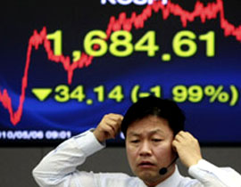 ازمة الديون اليونانية تؤدي لتدهور اسواق الاسهم الاسيوية صورة رقم 1