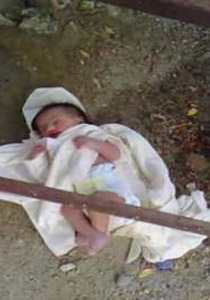 عدنا إلى عصر الجاهلية؟؟ سوري يئد طفلته!!  صورة رقم 1