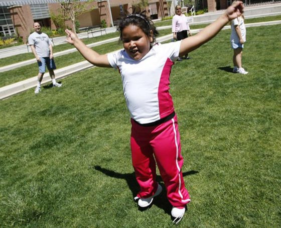 ميشيل أوباما تطالب بقانون لتحسين تغذية الأطفال!  صورة رقم 3