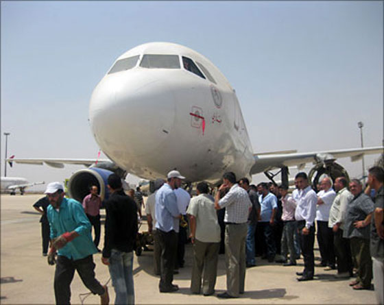 رياضي سوري يجرّ طائرة يزيد وزنها عن الـ 70 طن!!  صورة رقم 3