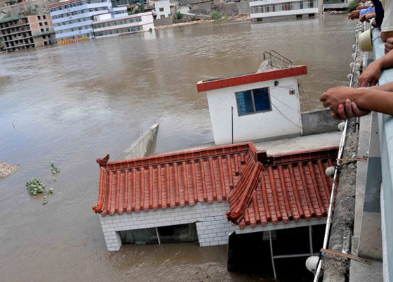 إجلاء 50 ألف شخص من الصين جراء الفياضانات في كوريا  صورة رقم 3