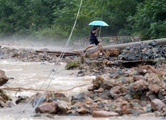 إجلاء 50 ألف شخص من الصين جراء الفياضانات في كوريا  صورة رقم 10