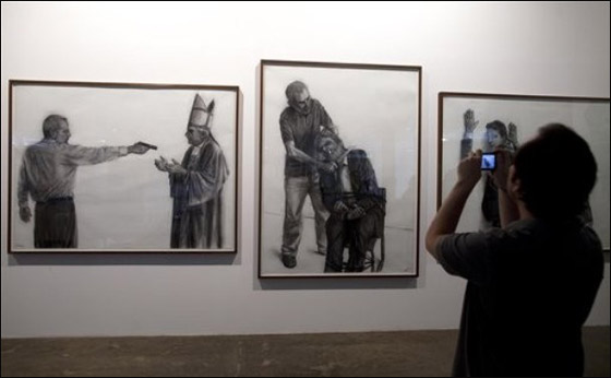 رسام برازيلي ينتقم من كبار رؤساء العالم من خلال رسوماته!!  صورة رقم 4