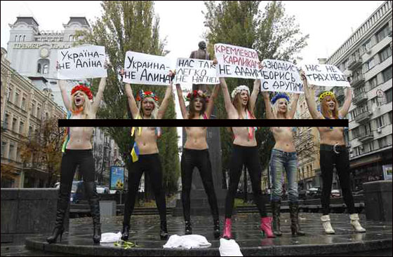 نساء أوكرانيات يتصدين لزيارة بوتين عاريات الصدور!  صورة رقم 8