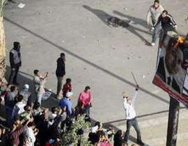 عمليات نهب وغياب الأمن في مصر وعشرات الجثث في المستشفيات صورة رقم 1