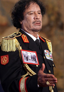 تشبيه القذافي بـ تشبيه القذافي بـ