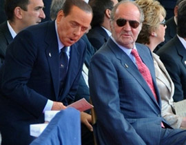 الاعلام ينتقد برسكلوني بسبب لمسه ذراع الملك خوان كارلوس  صورة رقم 1