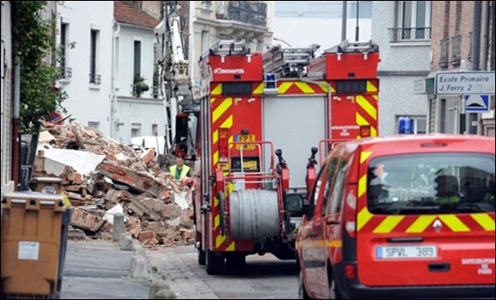 بالصور.. انهيار فندق 4 طوابق على منزل يقتل عائلة كاملة!!  صورة رقم 14