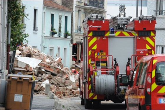 بالصور.. انهيار فندق 4 طوابق على منزل يقتل عائلة كاملة!!  صورة رقم 5