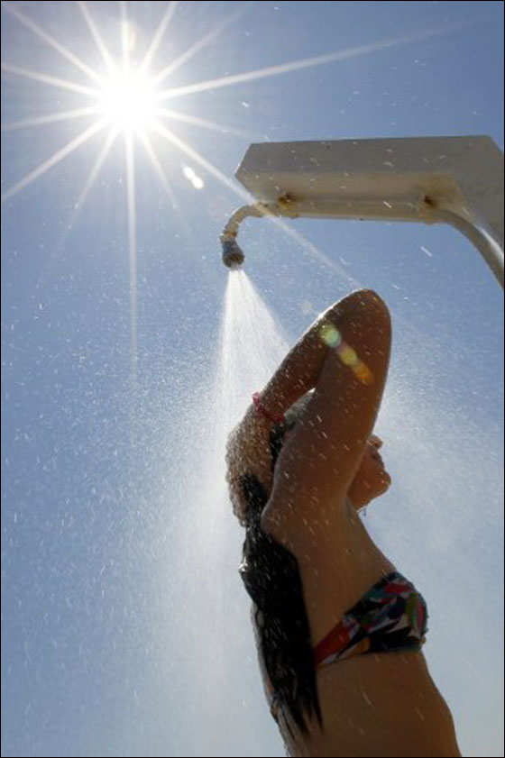 بالصور: الحر الشديد اكثر قسوة من البرد القارس في دول اوروبا!  صورة رقم 33