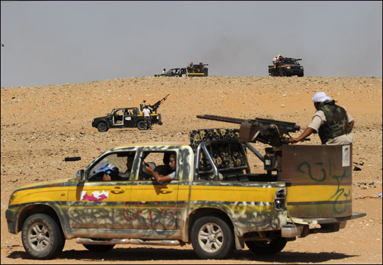 اشتباكات عنيفة وقتلى وجرحى بين الثوار والكتائب في سرت  صورة رقم 12