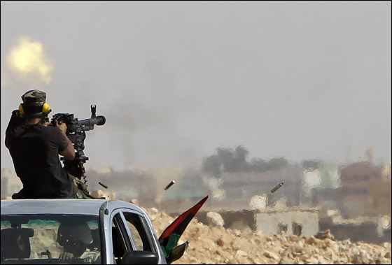 الثوار يسيطرون على معظم انحاء سرت ومعارك طاحنة في بني وليد!! صورة رقم 3