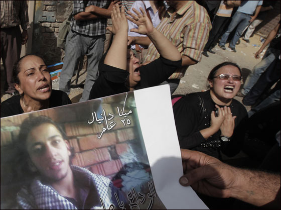 بالصور.. تشييع جثامين  ضحايا أحداث ماسبيرو في القاهرة  صورة رقم 19