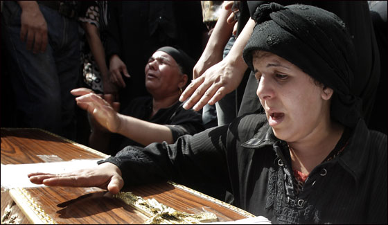 بالصور.. تشييع جثامين  ضحايا أحداث ماسبيرو في القاهرة  صورة رقم 17