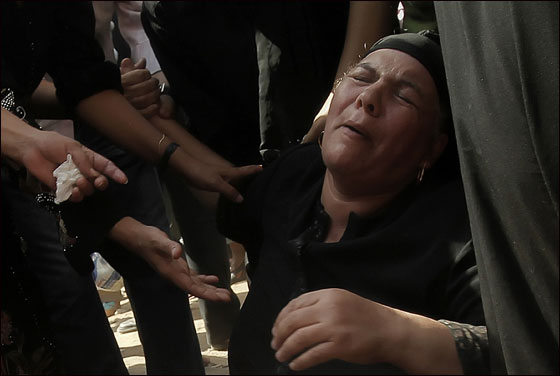 بالصور.. تشييع جثامين  ضحايا أحداث ماسبيرو في القاهرة  صورة رقم 6