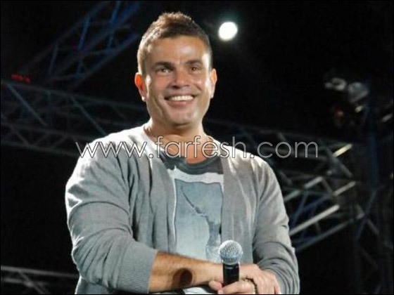 عمرو دياب يفاجىء الجميع بملابسه والفوضى تعم حفلته في العيد! صورة رقم 4 عمرو دياب يفاجىء الجميع بملابسه والفوضى تعم حفلته في العيد! صورة رقم 4