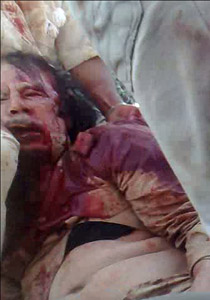 صحفي ليبي: القذافي ميت وما زال يشعل المظاهرات المؤيدة له! صورة رقم 1