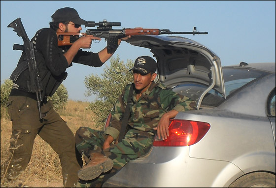 15 الف مقاتل من الجيش الحر يسيطرون على 60% من حمص صورة رقم 13