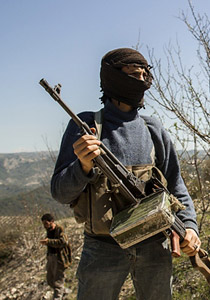 نقيب منشق عن الجيش السوري يروي بشجاعة فظائع النظام! صورة رقم 1