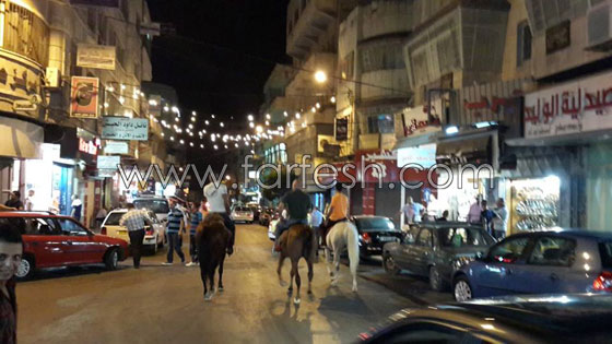 العاصمة الاقتصادية لفلسطين تعج بالأضواء وبهجة العيد  صورة رقم 3