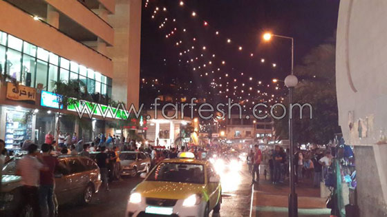 العاصمة الاقتصادية لفلسطين تعج بالأضواء وبهجة العيد  صورة رقم 5