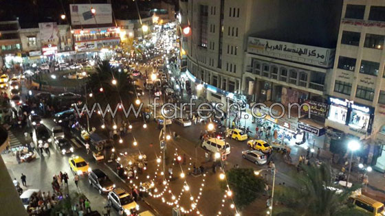 العاصمة الاقتصادية لفلسطين تعج بالأضواء وبهجة العيد  صورة رقم 10