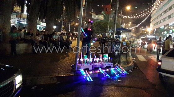 العاصمة الاقتصادية لفلسطين تعج بالأضواء وبهجة العيد  صورة رقم 15