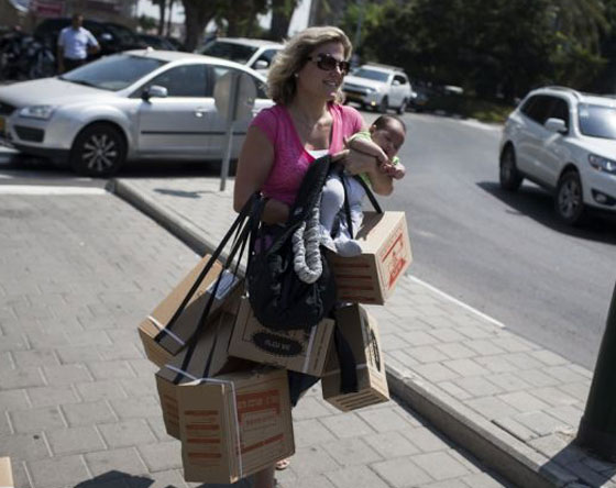 مطالبة اسرائيل بتوفير الاقنعة الواقية للفلسطينيين صورة رقم 1