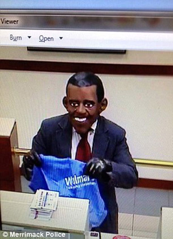 اوباما يسرق بنكا ببدلة وربطة عنق! صورة رقم 2