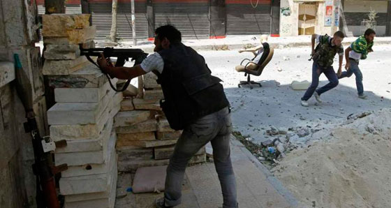 بالصور: المانيكان.. مقاتل غير شكل يدخل المعارك في سوريا! صورة رقم 4