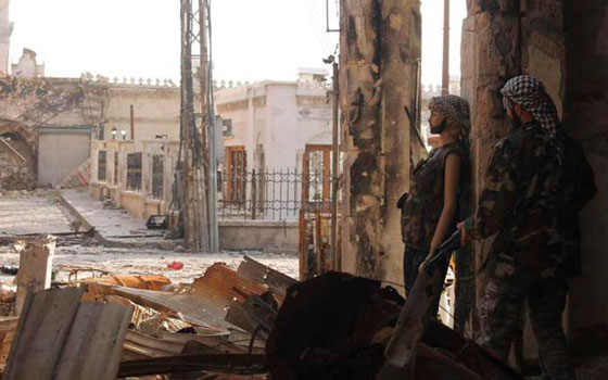 بالصور: المانيكان.. مقاتل غير شكل يدخل المعارك في سوريا! صورة رقم 9