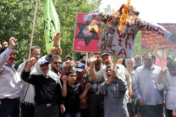 رفسنجاني يدعو للتخلي عن شعار معاد لاميركا! صورة رقم 8