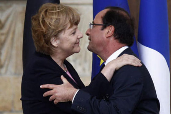 صور حميمية لهولاند وميركل تثير ضجة كبيرة.. شاهد الصور  صورة رقم 6