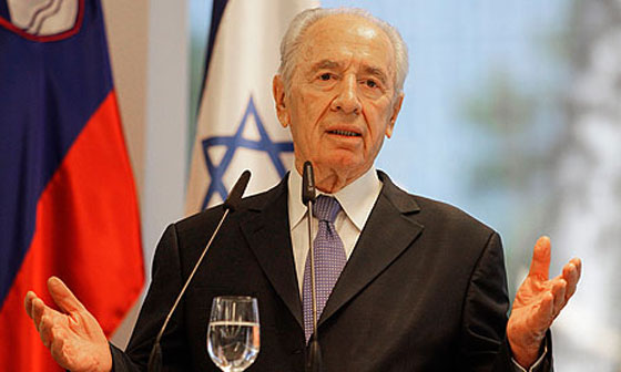 الرئيس الاسرائيلي شمعون بيرس يشارك في قمة عربية اسلامية بدبي صورة رقم 1