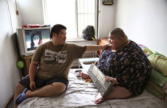 بالصور.. ربع طن تثقل كاهل شاب صيني وتعجِّز اسرته صورة رقم 5