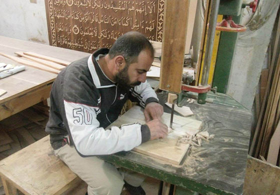 بالصور.. هل هو أكبر مصحف خشبي في العالم؟ صورة رقم 6