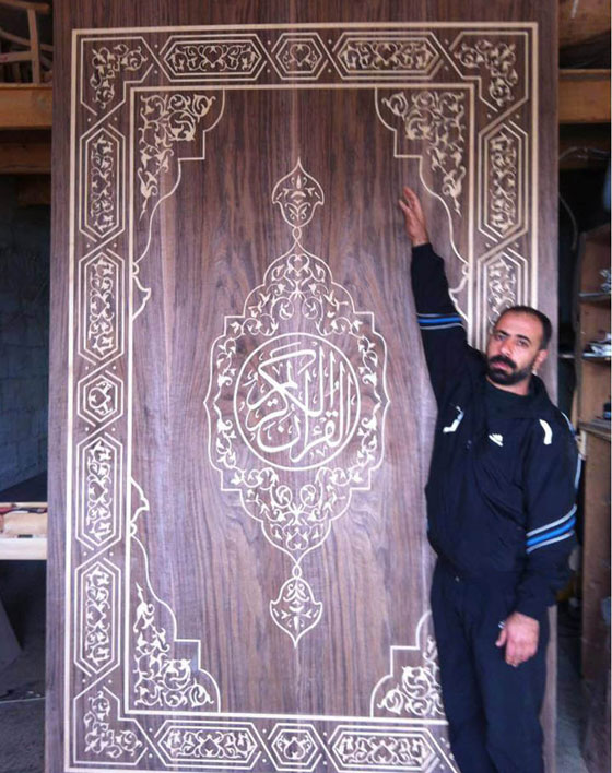 بالصور.. هل هو أكبر مصحف خشبي في العالم؟ صورة رقم 7