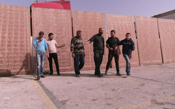 بالصور.. هل هو أكبر مصحف خشبي في العالم؟ صورة رقم 9