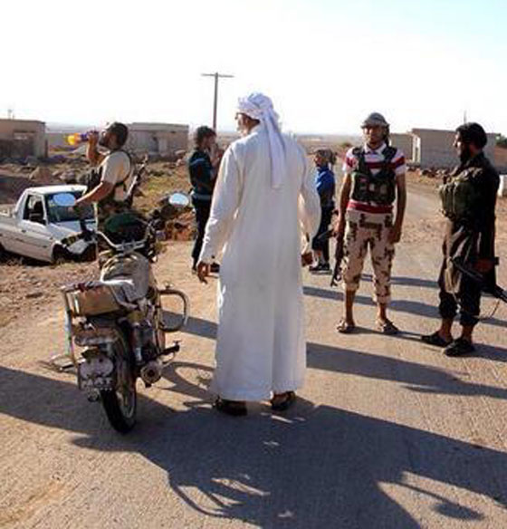 بالصور.. داعش يسيطر على جزء من كوباني يرتاحون وينتقمون صورة رقم 1