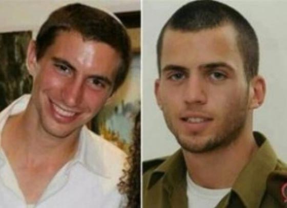  حماس تعلن انها تحتفظ بأسرى اسرائيليين احياء وجثث جنود صورة رقم 1