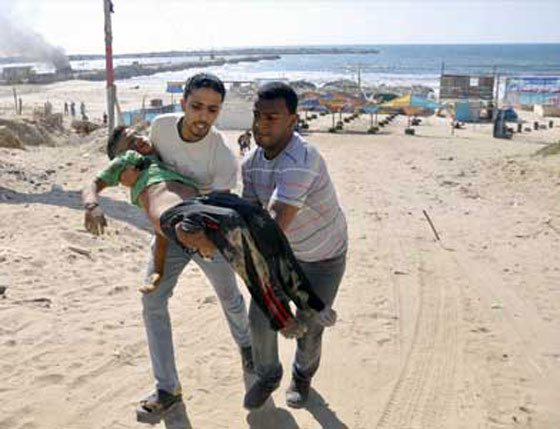  مذبحة الاطفال على شاطئ غزة بين اقوى الصور لعام 2014 صورة رقم 2