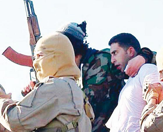  داعش ينشر مقابلة مع الطيار الاردني بلباس الاعدام وعليه آثار ضرب صورة رقم 2