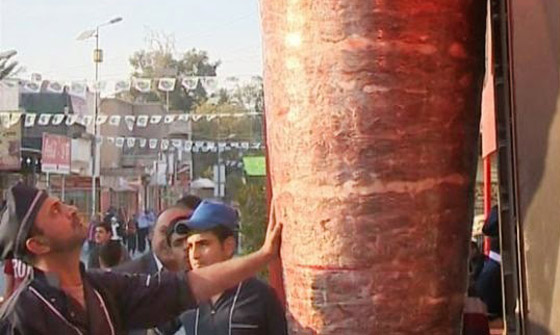 بمناسبة المولد النبوي.. أكبر سيخ شاورما في العراق يدخل غينيس صورة رقم 3 بمناسبة المولد النبوي.. أكبر سيخ شاورما في العراق يدخل غينيس صورة رقم 3