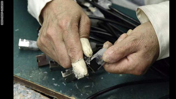 بالصور.. نظرة على الحياة التعيسة والمملة للعمال الصينيين صورة رقم 7 بالصور.. نظرة على الحياة التعيسة والمملة للعمال الصينيين صورة رقم 7