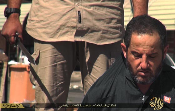 بالصور.. داعش ينحر اعناق اربعة عراقيين في تكريت صورة رقم 2