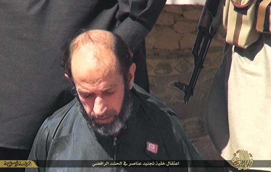 بالصور.. داعش ينحر اعناق اربعة عراقيين في تكريت صورة رقم 4