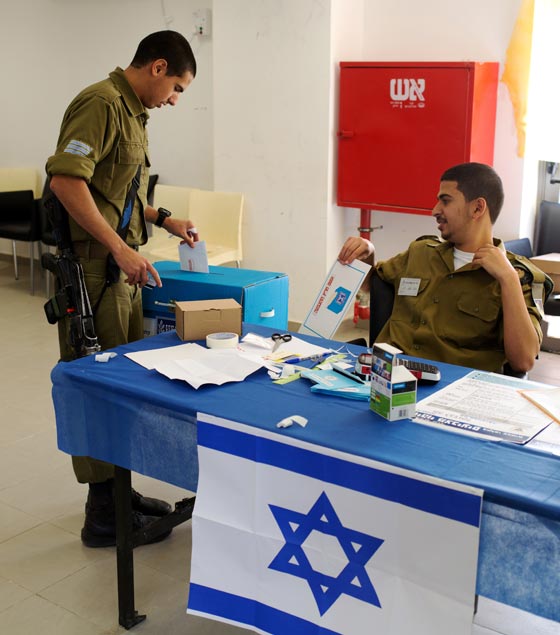 فتح صناديق الاقتراع لانتخابات الكنيست الـ 20 في اسرائيل صورة رقم 20